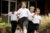 Children in school uniform running with joy