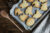 Halloween themed biscuits still on a baking tray