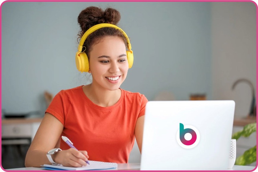A woman on a laptop with a blossom logo