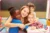 Mutual Respect image - An adult and three children hugging and looking to camera
