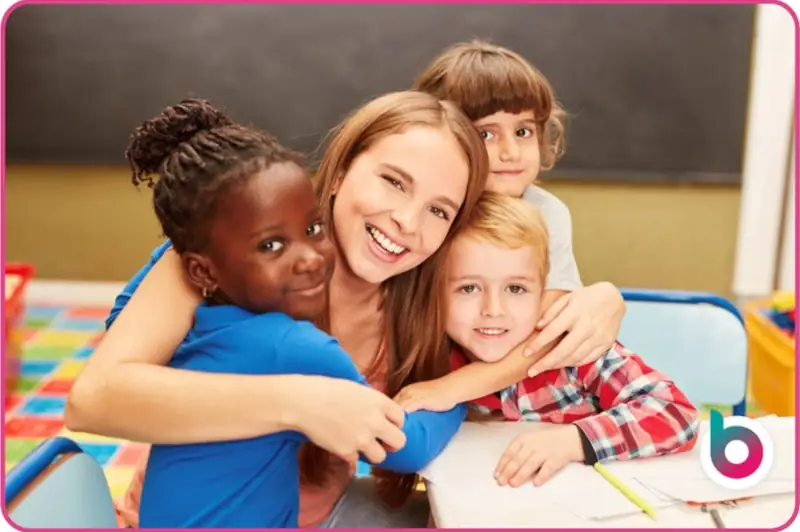 Mutual Respect image - An adult and three children hugging and looking to camera