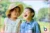 two children laughing while outside