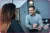 a man interviewing a woman