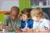 Young children playing/solving a puzzle together