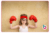 An image of a child with boxing gloves on