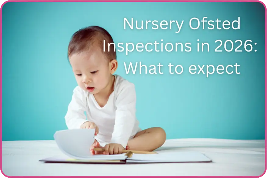 A baby reading a notebook